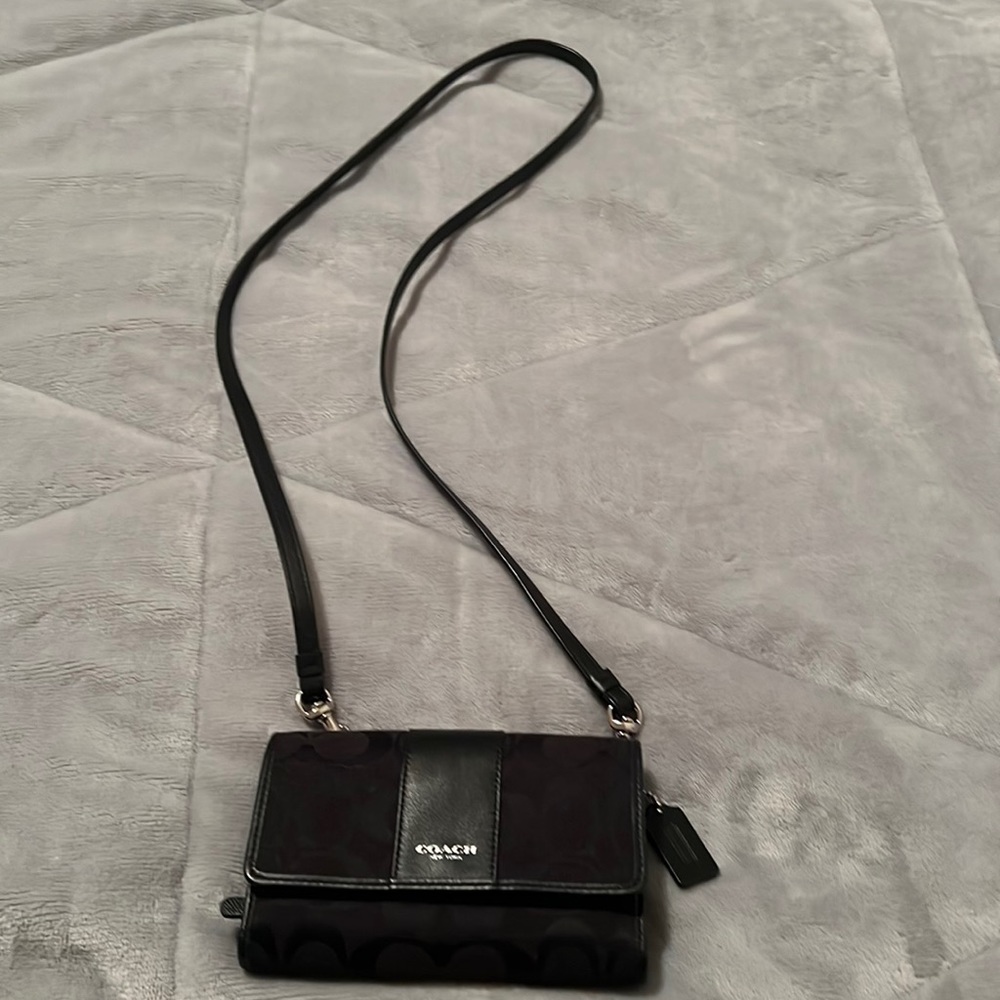 Coach wallet in a string